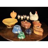 A Group of Kitchen Pottery: A pair of French early 20th century relief-moulded Majolica game dishes