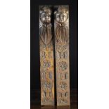 A Pair of Late 17th/Early 18th Century Carved Oak Terminals ornamented with protuberant angel heads