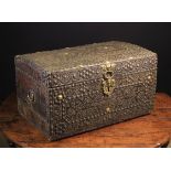 A Fine Late 17th Century Leather Clad Chest profusely ornamented with intricate brass stud-work and