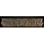 A 19th Century Carved Ornamental Frieze Rail depicting cherubs riding a chariot pulled by goats to