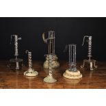 Three Pairs of Wrought Iron Candlesticks.