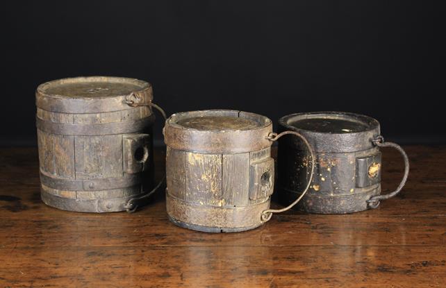 Three Early 19th Century Iron Bound Coopered Oak Costrels of cylindrical form,