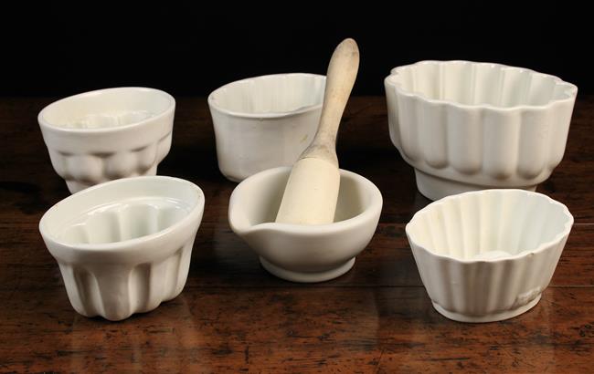 Five White Glazed Pottery Jelly Moulds & a white ceramic pestle & mortar;