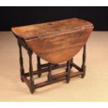 An 18th Century Oak Gateleg Table.