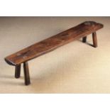 An Early 19th Century Long Low Primitive Bench (A/F).