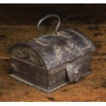 A Small 16th/17th Century Dome Topped Iron Casket with a handle to the lid and an embossed sheet