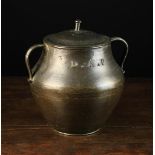 A 16th Century Turned Bronze Twin-handled Bulbous Pot and Cover with cast initials D.A.P..
