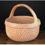 A Large Lead-glazed Stoneware Basket pierced with a profusion of draining holes, 13" (33 cm) high,