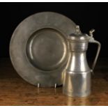 A Late 18th Century Scottish Pewter Tappit Hen, the hinged lid surmounted by an acorn finial.