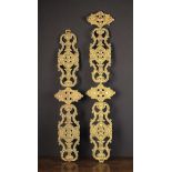 A Pair of 19th Century Embossed Gilt Sheet-metal Appliqués/Bell pulls, 35½" (90 cm) in length,