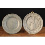 A Pair of Embossed Pewter Plates, possibly German,