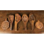 Six Antique Chip Carved Treen Butter/Biscuit Moulds.
