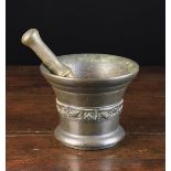 A 17th Century 'Whitechapel' Cast Bronze Pestle & Mortar. The pestle 8¼" (24 cm) in length.