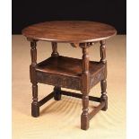A Late 19th Century Oak Monk's Chair/Table in the early 17th century style.