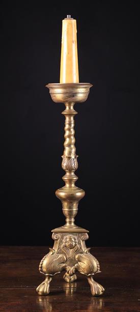 A Flemish Baroque Pricket Candlestick converted to the lamp with faux candle to the dished drip pan