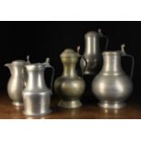 A Group of Five Antique Pewter Flagons: A Large pot-bellied flagon with shell crested thumb piece