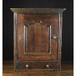 A Late 18th/Early 19th Oak Spice Cupboard.