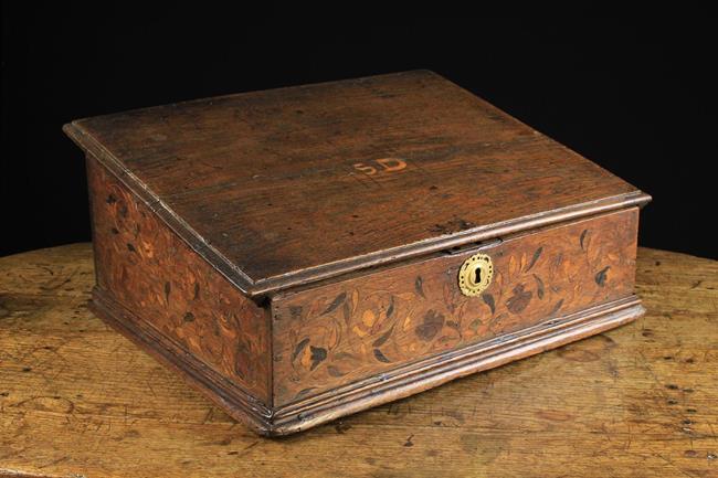 A Mid 17th Century Oak Desk Box with marquetry inlay and initials 'S.D'. to the sloped lid.