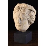 A Carved Renaissance Stone Head of a Goddess, 16th Century, mounted on a block base,