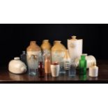 A Collection of Stoneware & Glass Bottles & Jars to include two stoneware hot water bottles.