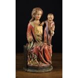 A 17th Century Polychromed Wood Carving of the Enthroned Virgin & Child.