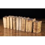 A Group of Nine Books Including;
