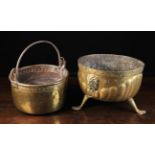 Two Antique Brass Vessels: A hanging pan having a copper riveted rim band and rolled edge with iron