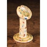 A Halifax Pottery Watch Stand daubed in brown and blue glaze on a cream glazed ground,