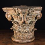 An Antique Carved Wooden Capital with residual paint-work decorated with two tiers of crested