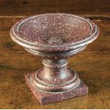 A Late 17th/Early 18th Century Turned Pophyry Tazza with a shallow bowl centred by raised stud ,