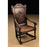 A 17th Century Oak Wainscot Chair.