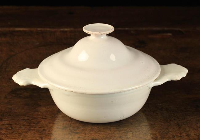 A Late 18th Century Faience White Glazed Tureen with Cover.