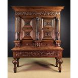 A Mid 17th Century Flemish Carved Oak Beeldenkast on stand.