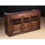 A Joined Oak Spindled Mural Cupboard in the 18th Century North Wales manner.