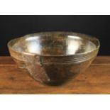 A 19th Century Treen Bowl (A/F), probably beechwood, with residual dark stain,