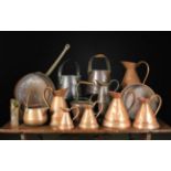 A Collection of Copper-ware: A set of five graduated measuring jugs with conical bodies,