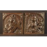 A Pair of Fabulous Early 16th Century Carved Oak Arcaded Panels: One depicting Madonna & Child,