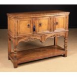 A Carved Golden Oak Credence Cupboard Circa 1900;