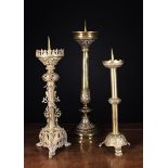 Three Large 19th Century Cast Brass Pricket Candlesticks: One Neo-Gothic with elaborately cast