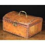 A Leather Clad Casket of rectangular form with slightly domed lid centred by a gilt brass swing