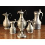 Five Pewter Measures and a Pewter Candlestick: To include a graduated set of three baluster ewers