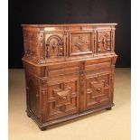 A Large 17th Century Oak Box-topped Enclosed Chest with decorative moulding and appliqués.