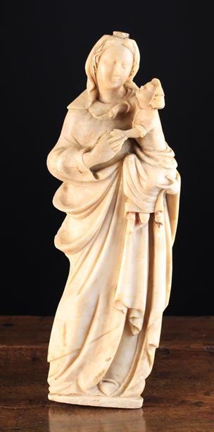 A 17th Century Alabaster Carving of Madonna & Child.