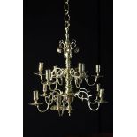 A Pretty 18th Century Style Twelve Branch Brass Chandelier with two tiers and six candle arms