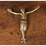 A Romanesque Bronze Appliqué Figure of Christ Crucified with residual gilding and engraved details,