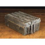 A 14th/15th Century Cuir Boulli Missal Box bound in iron straps with two hasps to the front.