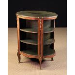 An Oval Free-Standing Bookcase in the Louis XVI Style.