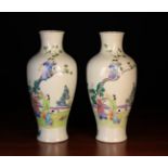 A Similar Pair of Chinese Baluster Vases decorated in polychrome enamels with children gathering