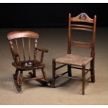 Two Late 19th/Early 20th Century Child's Nursery Chairs: A bar-backed rush seat chair with a domed