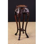 An Early 20th Century Chinese Carved Hardwood Plant Stand.